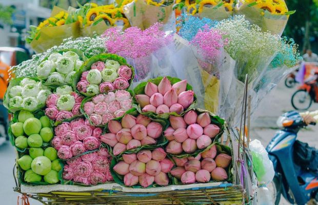 Street vendors selling flowers in Hanoi